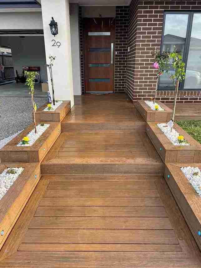 Front Entry Deck with Floral Planters (2)